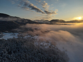 Panoramic view of sunrise over fresh snow in the mountains of the French Alps