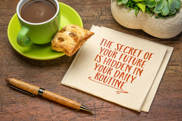 the secret of your future is hidden in your daily routine - inspirational handwriting on a napkin...
