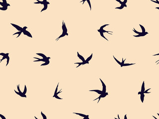 Seamless pattern with swallows. Black silhouettes of flying birds on a gentle coral background. Silhouette of a flock of swallows. Vector illustration for printing on fabric, paper, banner, packaging