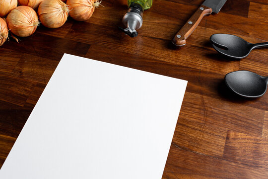 Hipster cafe menu empty mock up for concept design. Business concept. Template design. Information concept with kitchen objects on wooden table 