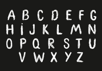 Letters of the English alphabet. A set of decorative letters that are drawn with white chalk on a black chalkboard. All objects are isolated