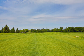 View of Golf Course with beautiful green field.