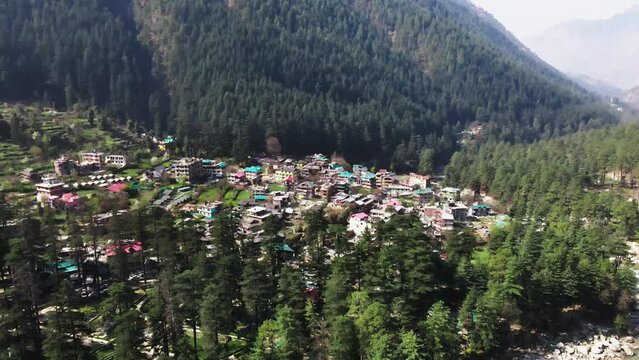 Kasol remote rural village in india Himalaya Parvati valley mountains aerial view of green natural forest Mother Earth