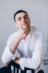 Close up portrait handsome brunette young man. Businessman, professional man concept 