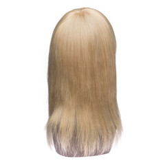 Natural hair wig on a mannequin on a white isolated background. Blonde, long straight hair. Back view