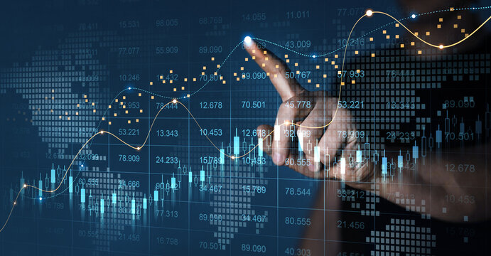 Trader analyzing data on virtual screen.Price graph and indicator. Stock market invest and crypto currency. Stock market and business investment. 