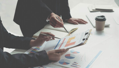 Fund managers team consultation and discuss about analysis Investment stock market by digital...