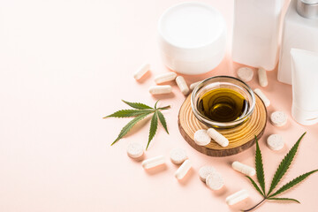 Cannabis cosmetic, pills and CBD oil. Alternative medicine and natural cosmetic concept.