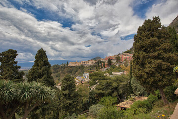 Fototapeta na wymiar Panorama of the touristic city of Taormina, located in eastern Sicily.