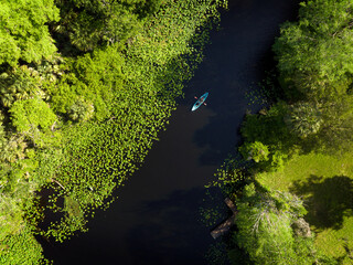 Man kayaking in Wekiwa river near Wekiwa Island.  Wekiwa island is located north of Orlando Florida.  April 20, 2022