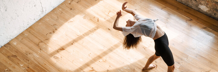 Young brunette white woman dancing contemporary