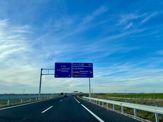 Spanish highway A3 with road sign indicating way to Madrid, Albacete, Alicante.