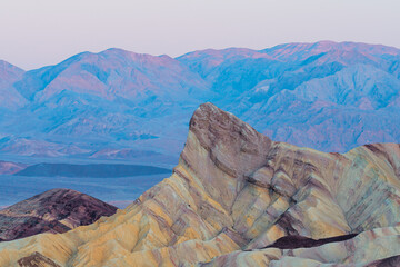 Manly Beacon at sunrise, close up details, Zabriskie point in Death Valley National Park, California