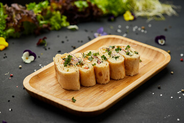 Snacks of pita bread with cheese and tomatoes. Variety mix of small sandwiches on dark background. Photo for restaurant menu