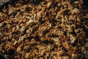 Traditional Turkish Doner Kebab meat. Shawarma or gyros. Turkish, greek or middle eastern arab style chicken doner kebab food in restaurant.