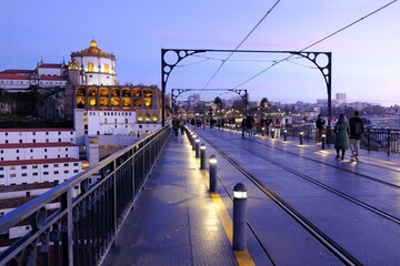 Monastery of Serra do Pilar and famous bridge Ponte Dom Luis I in night. Porto, Portugal. It is on the UNESCO World Heritage List.   