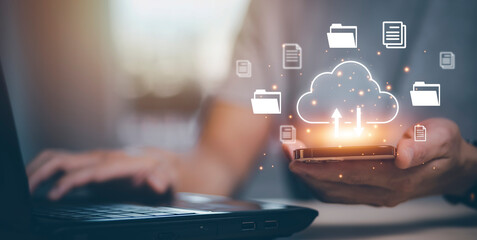 Hand using laptop with touch connect to data information on the Cloud Computing Technology Internet Storage Network Concept, big data internet technology, Cloud sharing download and upload.