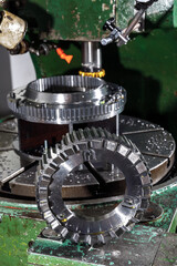 Metal processing machine. Detail of a tool in production