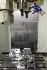 Metal processing machine. Detail of a tool in production
