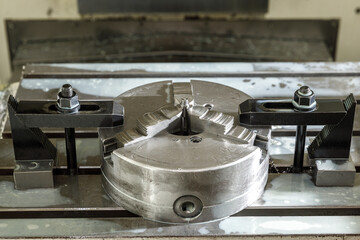 Metal processing machine. Detail of a tool in production