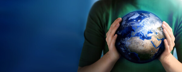 Earth day, Human hands holding blue earth, save earth concept.