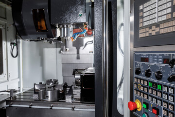 Metal processing machine. Detail of a tool in production