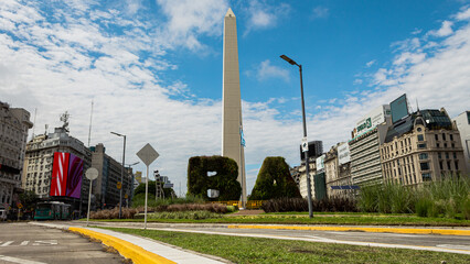 symbol of the city of buenos aires and the obelisk in the background - obrazy, fototapety, plakaty