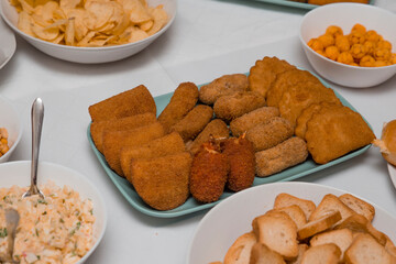 Table with a variety of food for the main meal.