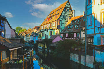 Colourful traditional half-timbered houses on river bank in Colmar,   Alsace rigion, France