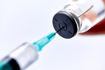  Vaccine in vial with syringe
