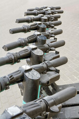 Electric scooter handlebars in a row In Gdynia in Poland