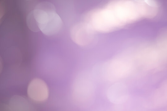 Abstract blur purple bokeh background. Defocused blurred color light background