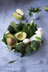 Green vegetables and fresh fruits containing vitamin K. Foods rich in vitamin K, minerals and...