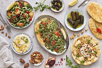 Traditional Lebanese appetizers assortment. Chickpea Fatteh, Tabbouleh, Fattoush Salad, Hummus....