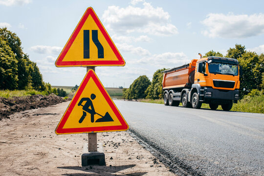 A sign of road repair. Concept of road work