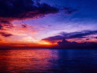 Fototapeta na wymiar Sunset over the sea, Beautiful cloudy sky