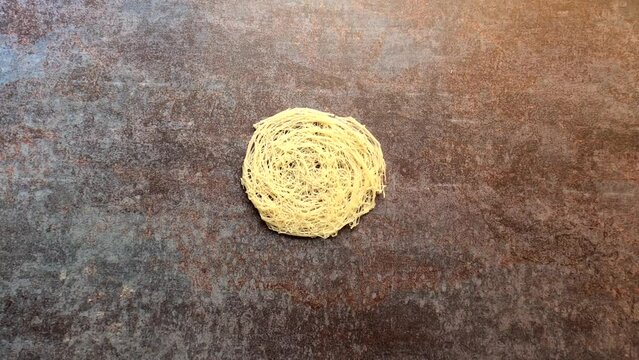 Raw whole dried round string hopper rice noodles