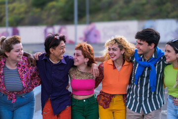 Group of diverse teenage making a video with old camera