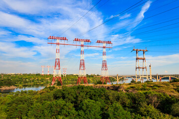 Fototapeta na wymiar High voltage power line across the Dnieper river on Khortytsia island in Zaporizhia, Ukraine