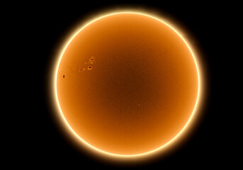 Sun in dark space with solar spots on the 20th April 2022