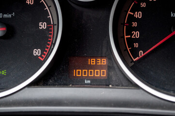 Fototapeta premium 100 000 km in car. Speedometer in a car with a mileage indicator.
