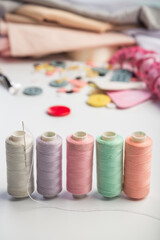 Threads for sewing on a colored background