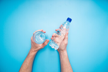 person holding a bottle of water