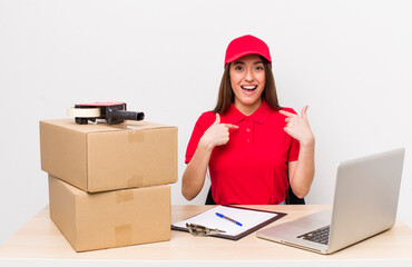 hispanic pretty woman feeling happy and pointing to self with an excited. company employee concept