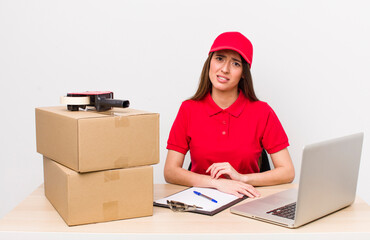 hispanic pretty woman feeling puzzled and confused. company employee concept