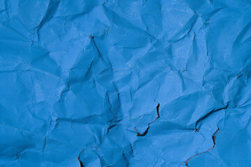 Blue creased sheet of paper.