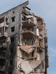 War in Ukraine, ruined building after bombing.