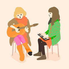 Young musicians playing musical instruments. Girls playing guitar and keyboard.