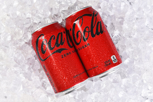 IRVINE, CALIFORNIA - 20 APR 2022: Two cans of Coca-Cola Zero soda in a bed of ice