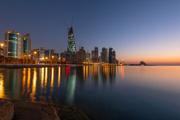 Fototapeta premium Doha Skyline view early morning. Doha Corniche beach